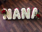 nanna nana letters white chrysanthemum  roses fresh flowers  floral funeral tribute Darlington designer floral tribute funeral sympathy tribute heavenly scent florist Darlington local free delivery